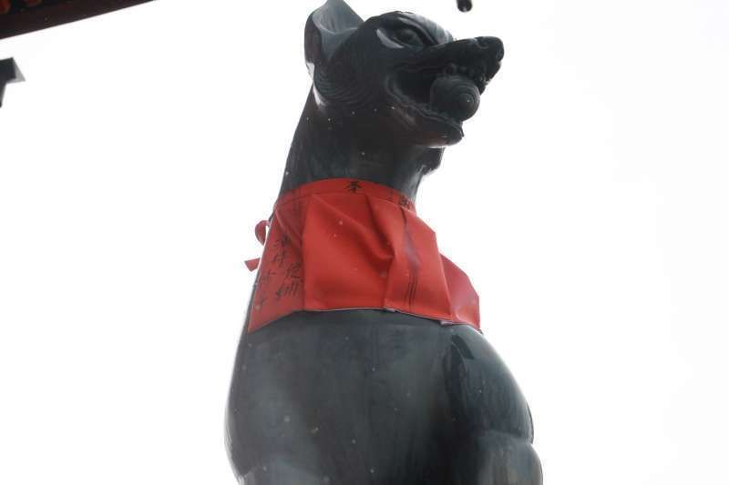 Kyoto Private Tour - Fushimi Inari Shrine.  Byakko. Gods' messenger fox holding a ball in its mouth.