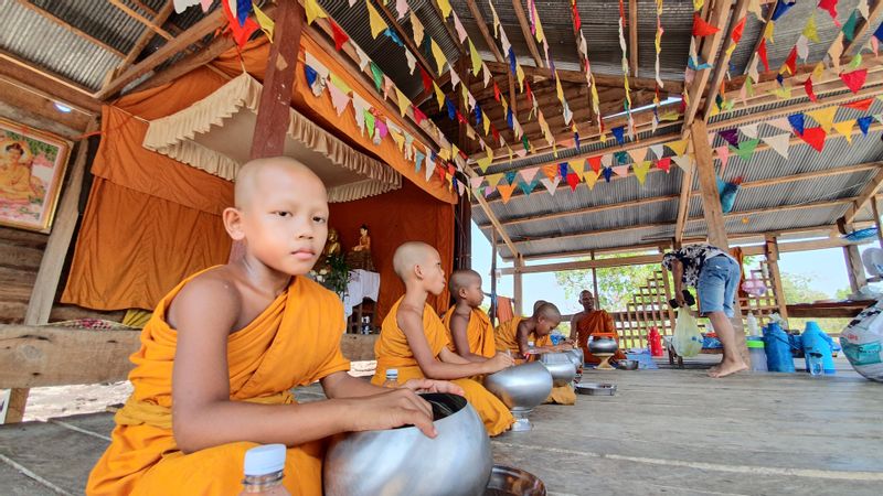 Siem Reap Private Tour - monk at lunch 