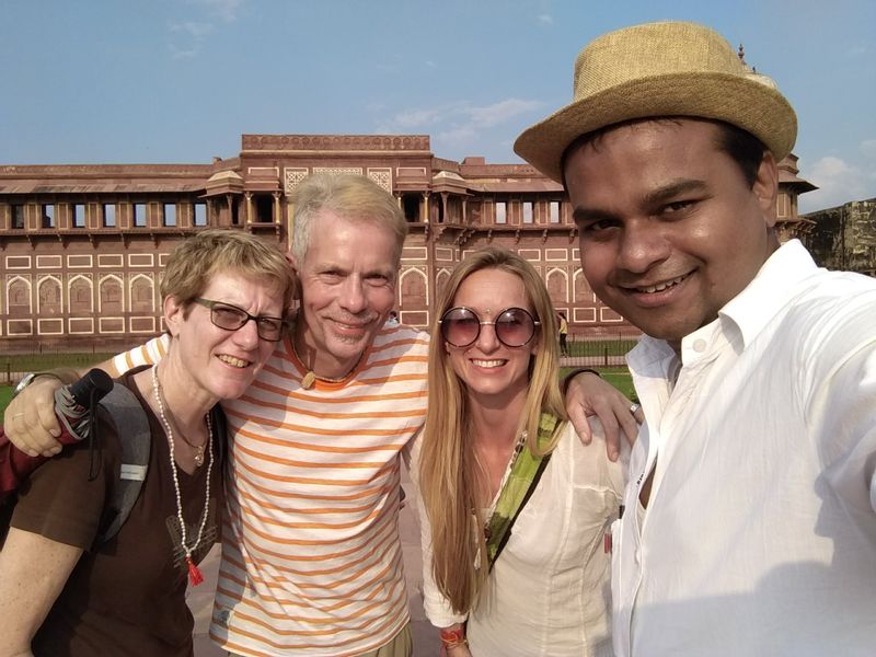 Agra Private Tour - Atiq with his happy travellers at Agra Fort.