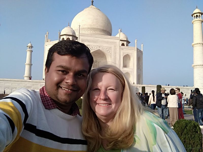 Agra Private Tour - Atiq with one of his happy traveller at Taj Mahal