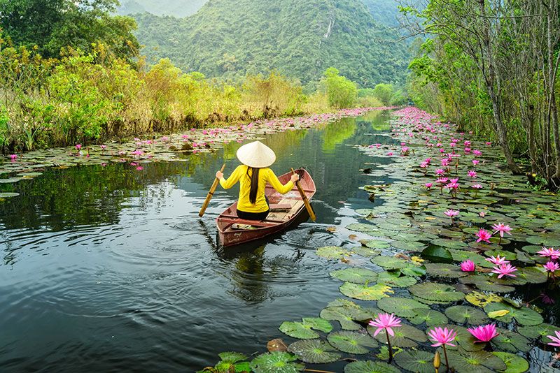 Hanoi Private Tour - sailing on wooden boat