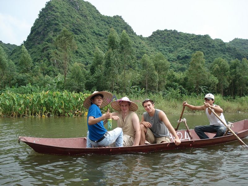 Hanoi Private Tour - sailing on river to pagoda