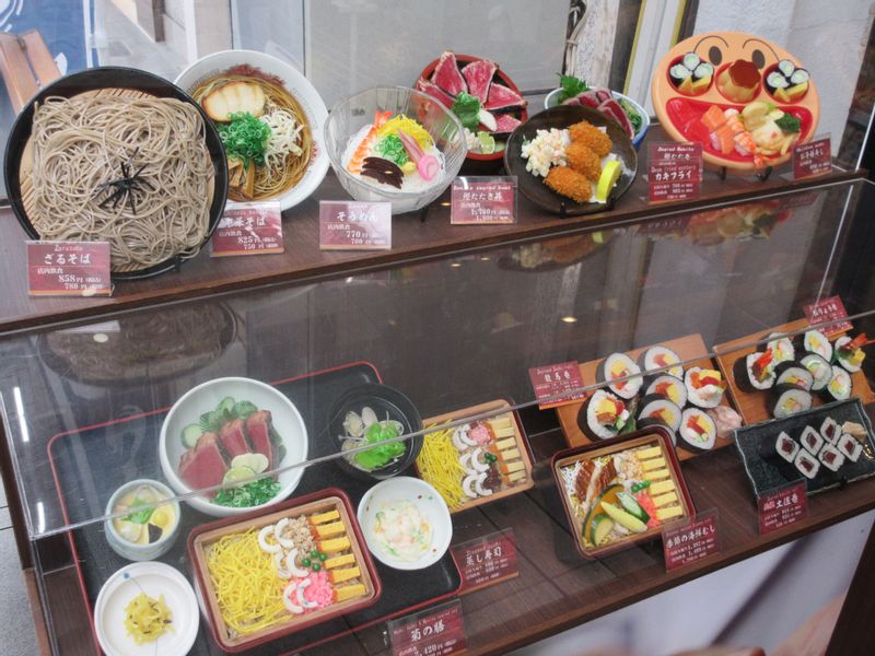 Kochi Private Tour - plastic food models in the showcase of a restaurant 