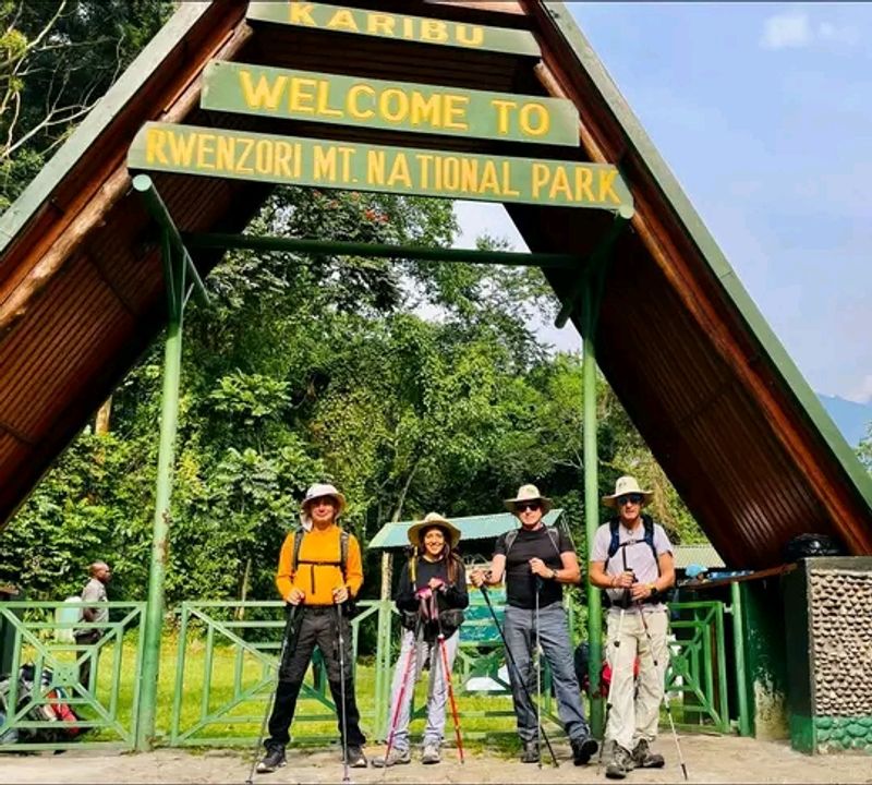 Kampala Private Tour - Rwenzori Mountain just at the gate with clients ready to start the hike