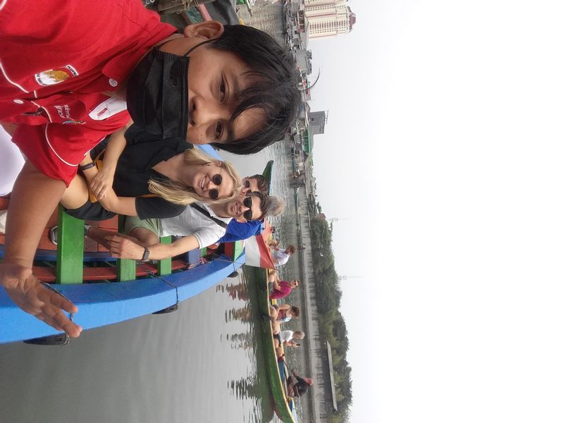 Jakarta Private Tour - On the fisherman boat with the clients