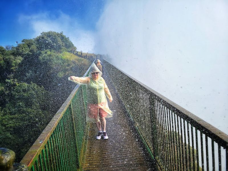 Livingstone Private Tour - Rainy sprays on the Knife Bridge of the Victoria Falls