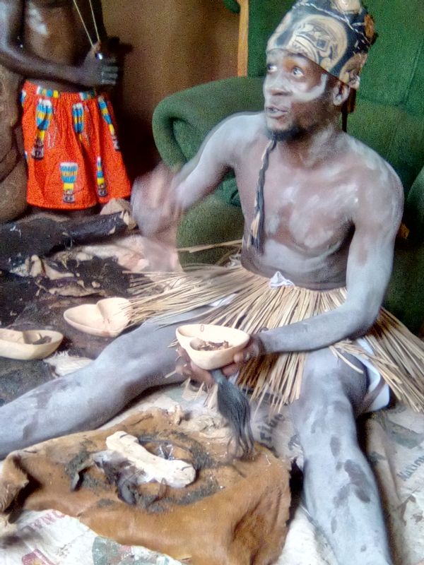 Livingstone Private Tour - A traditional healer doing his things in style at Mukuni Village