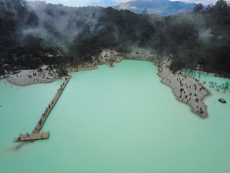 Bandung Private Tour - Kawah Putih (White Crater).
The Crater Lake and its surroundings are dominated by a pale white color which radiates a rather hypnotizing ambience.