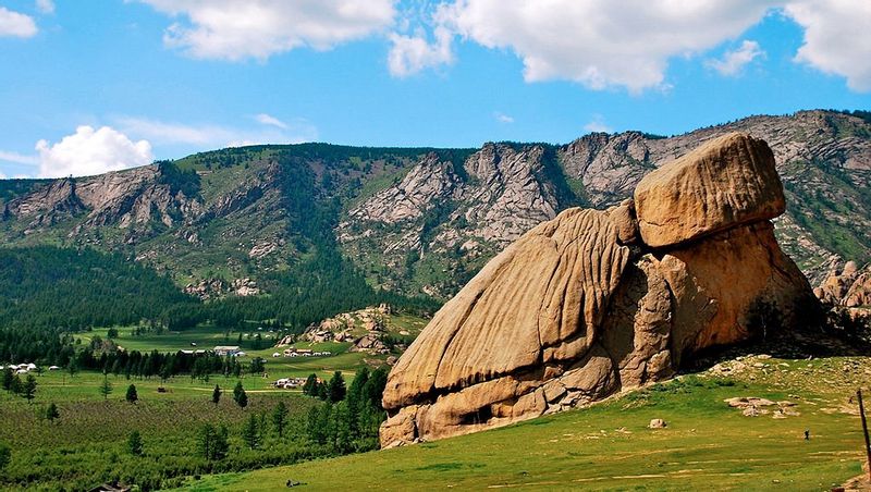 Ulaanbaatar Private Tour - The turtle rock ”Melkhii Khad”, is a surprising granite rock, 24 meters (79 feet) high, whose form reminds of a turtle. It is a great spot to take photos. 