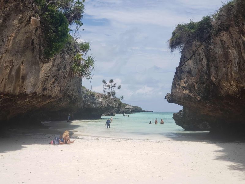 Zanzibar Private Tour - Guests swimming at Mtende beach