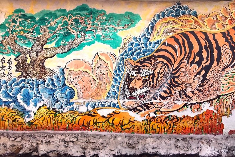 Seoul Private Tour - Evocative wall-painting of a sacred tiger & pine, on the way up.