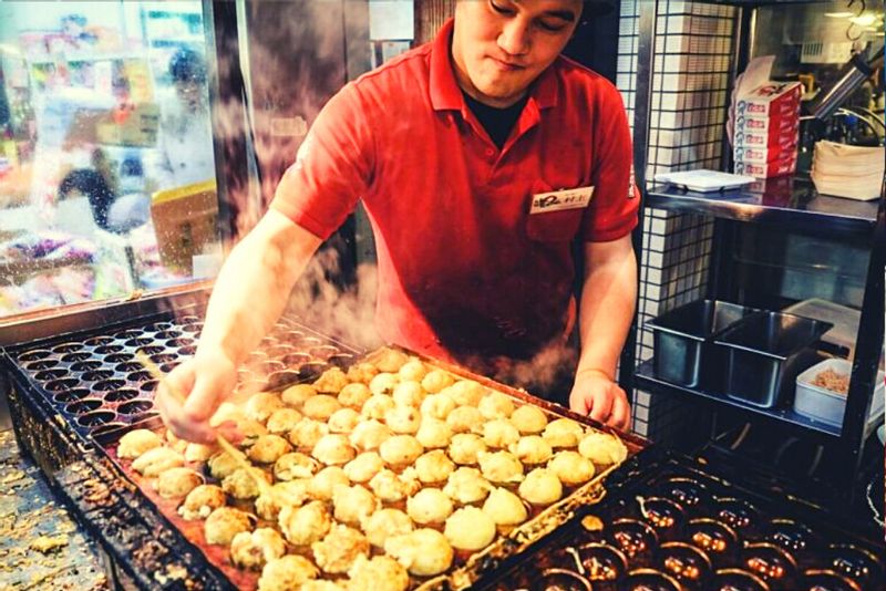 Osaka Private Tour - Takoyaki, the dish of all dishes in Osaka. Wheat based balls with boiled octopus in them with your choice of topping! Yum and we know the best place to get them