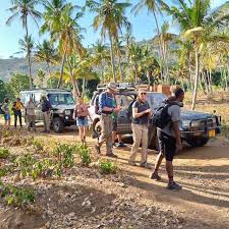 Tanga Private Tour - Hiking in a beautiful valley heading to waterfalls