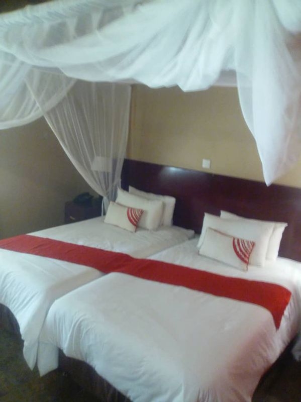 Livingstone Private Tour - You will sleep on comfortable beds with clean beddings covered with mosquito nets at Kasbek Lodge