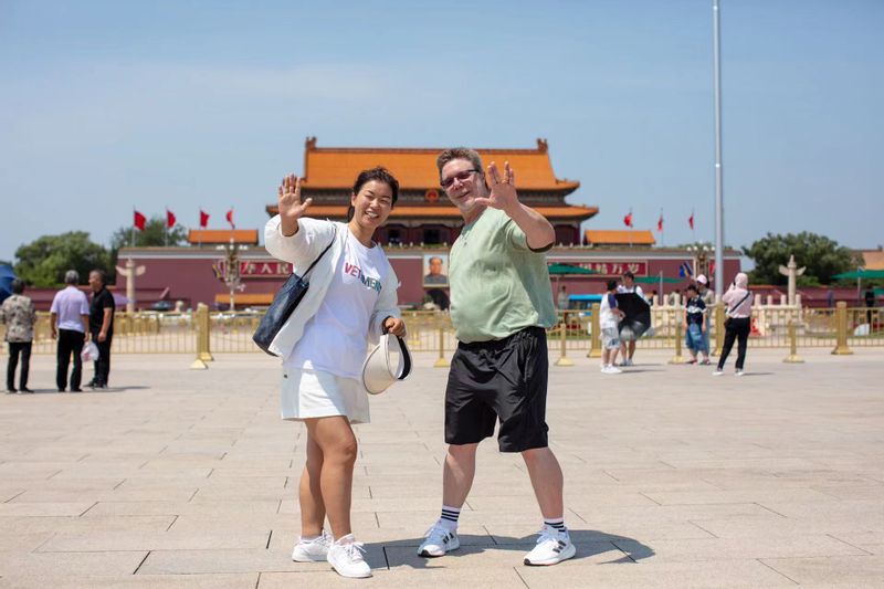 Beijing Private Tour -  Cathy with customer at Tiananmen square 