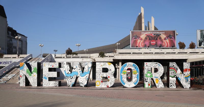 Pristina Private Tour - Newborn Monument, typographic sculpture and tourist attraction