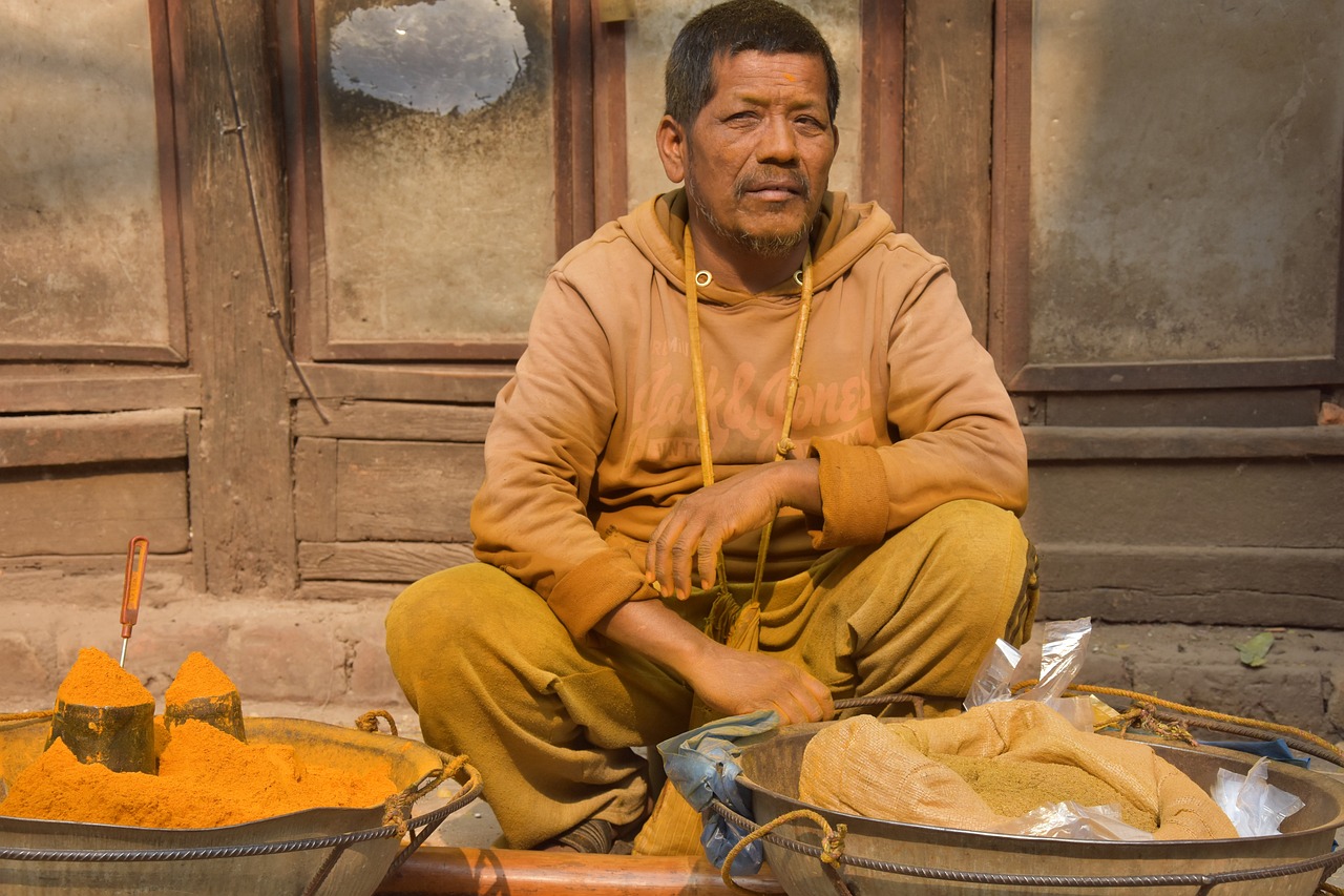 A man selling spices on a Nepali street