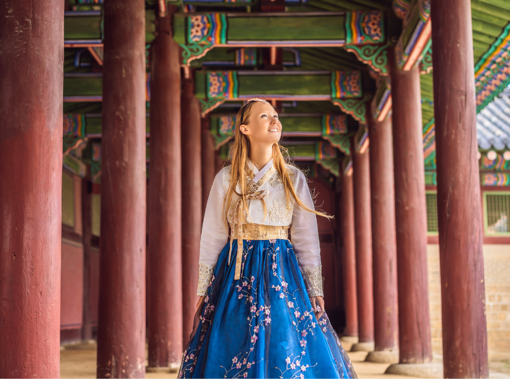 A woman wearing a traditional Korean dress known as Hanbok